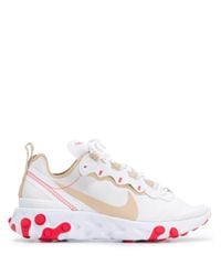 react element 55 trainers in white and orange