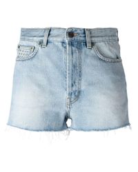 Saint Laurent Denim Jeans-Shorts mit Nieten in Blau - Lyst