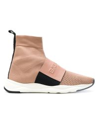 Zapatillas estilo calcetín con logo Balmain de Cuero de color Neutro | Lyst