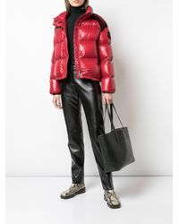 embossed monogram motif leather tote