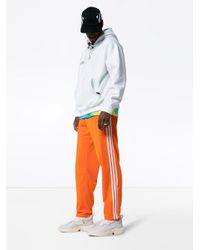 adidas Gestreifte Jogginghose in Orange für Herren - Lyst