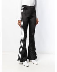 track pants flared adidas