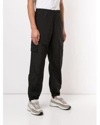 Supreme Synthetic Reflective Taping Cargo Trousers in Black for Supreme Synthetic Reflective Taping Cargo Trousers in Black for