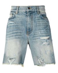 Shorts denim strappati da Uomo di Amiri in Blu | Lyst