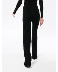 Totême Cour Ribbed Knit Trousers in 