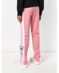 adibreak track pants pink