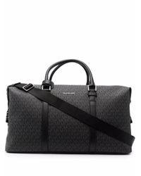 Michael Kors Holdalls and weekend bags for Men - Lyst.com