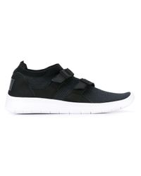 black nikes with strap