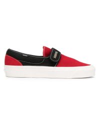vans slip on black and red