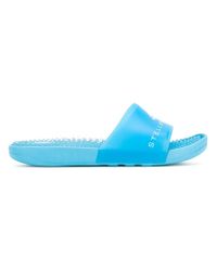 Chanclas Adissage adidas By Stella McCartney de Caucho de color Azul | Lyst