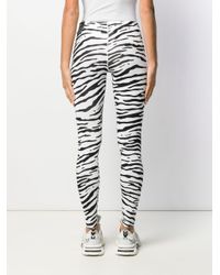 Nike Synthetic Zebra Print leggings in White - Lyst