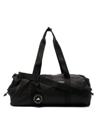 adidas By Stella McCartney Synthetisch Cilindervormige Sporttas in het  Zwart - Lyst