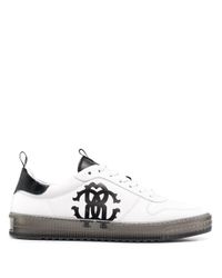Roberto Cavalli snake print heren sneakers grijs/zwart vind je in  Sneakerstad