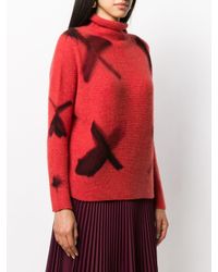 Pull à col roulé Suzusan en coloris Red