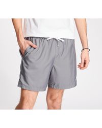 gray nike woven shorts