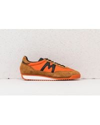 karhu championair jaffa orange