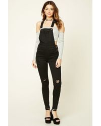 distressed black overalls