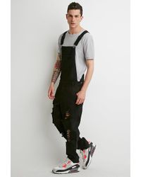 black overalls ripped