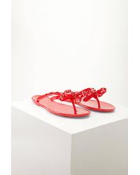 dizzy studded bow jelly sandals