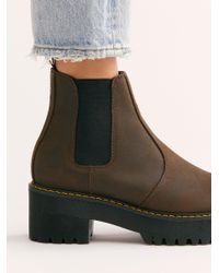 brown rometty dr martens