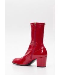 gucci patent leather boots