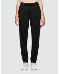 Alexander Wang Black Sleek French Terry Pull-on Track Pant With Logo Tape
