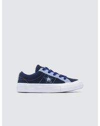 one star carnival suede low top
