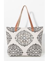 Pia Rossini - Bimini Natural/black Embellished Tassel Canvas Bag - Lyst