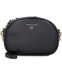 mk jet set camera bolsa