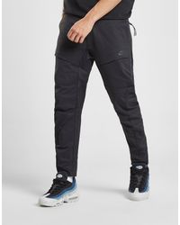 nike tech pack utility trousers