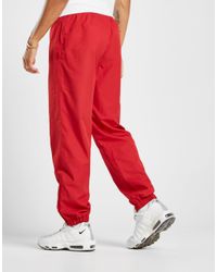 red lacoste guppy pants