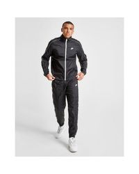 nike woven tracksuit mens