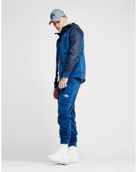 navy blue north face tracksuit