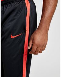 nike academy pants red