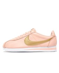 pink and gold nike cortez