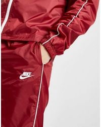 nike woven tracksuit red