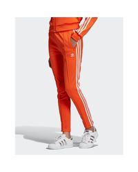 adidas womens orange tracksuit