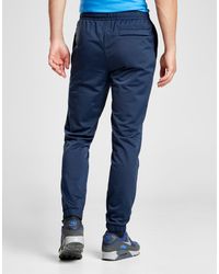 nike division poly track pants