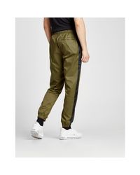 nike shut out track pants