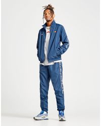 green sst track pants