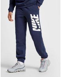 nike club navy joggers