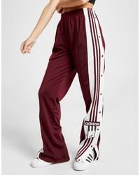adidas popper pants red