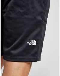 the north face train n logo shorts
