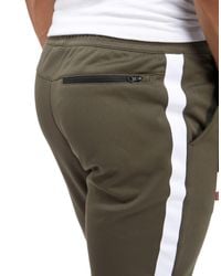 nike tribute track pants green