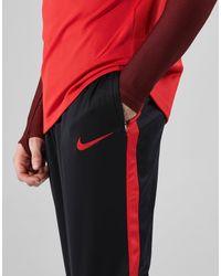 nike academy pants red