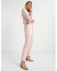 pale pink boiler suit