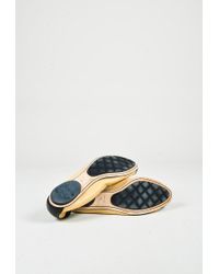 cream and black flats