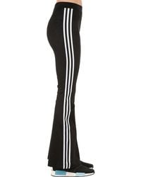 flared adidas track pants