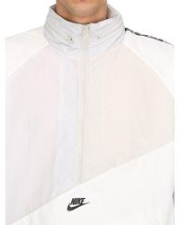 nike nsw taped woven anorak jacket