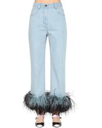 Jeans In Denim Con Piume di Prada in Blu | Lyst